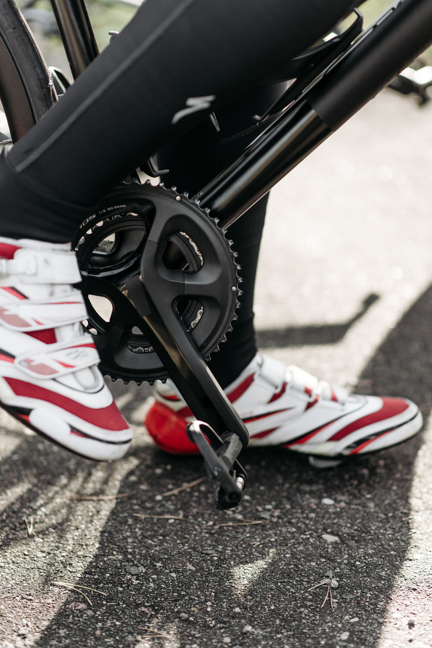 Close-up of a cycling shoe clipped into the pedal